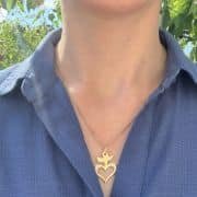 Pendentif coeur sacré doré